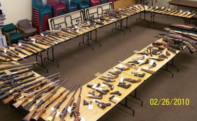 Photo of firearms seized or abandoned and then sold February 2010
